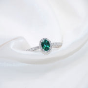 The Oval Emerald Diamond Halo Ring
